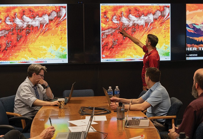 photo: wildfire monitoring in NOAA office